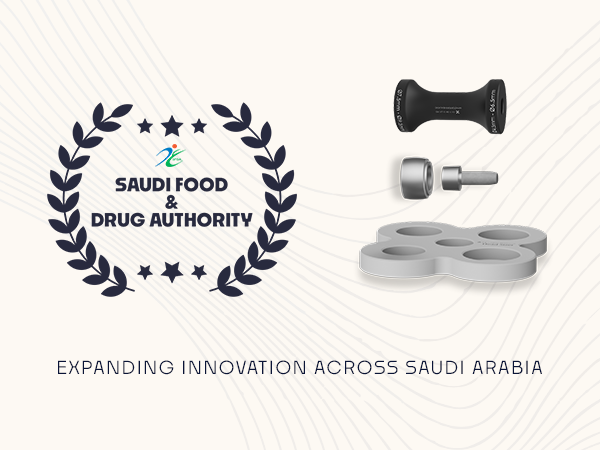 Saudi Food & Drug Authority emblem with a laurel wreath on the left, and gym weights (dumbbell and weight plates) on the right, with the caption 'Expanding Innovation Across Saudi Arabia' beneath.
